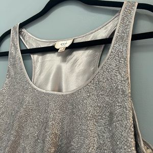 NWT boutique sequin racer back shirt.